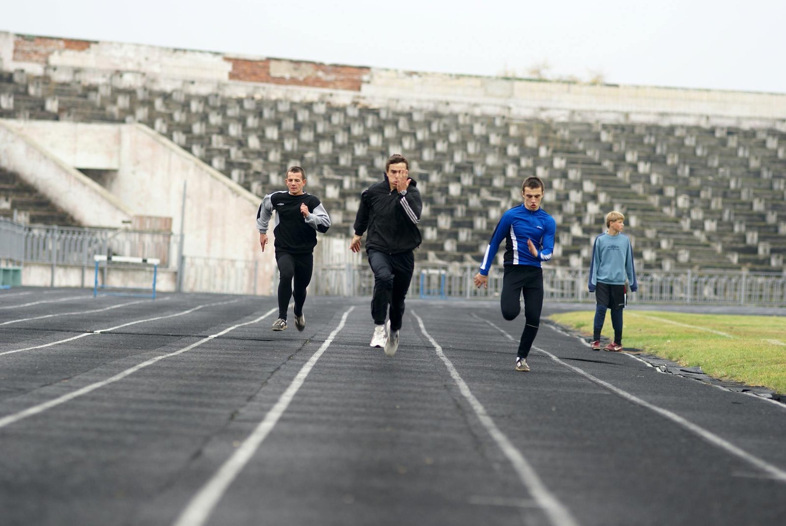 Athletes sprinting on a track